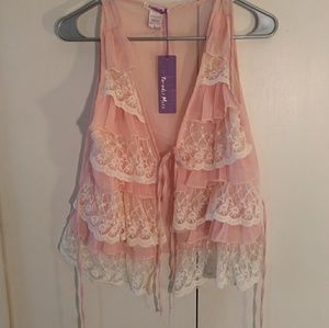 Girly frilled vest with lace detailing.